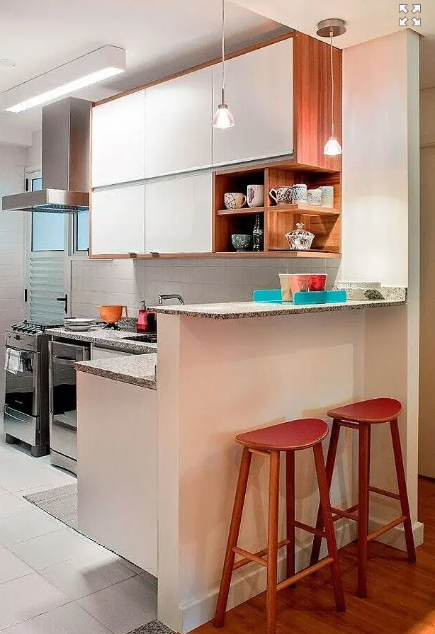Bancada de cozinha americana com ilha