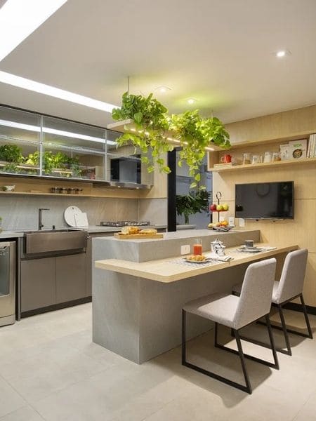 Bancada de cozinha americana com mesa