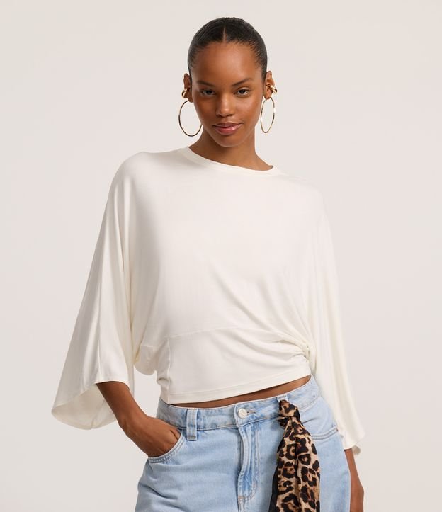 blusa manga 3/4 com jeans