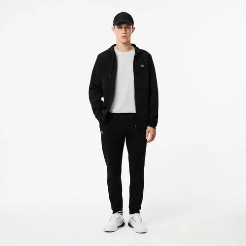 como usar boné Lacoste preto