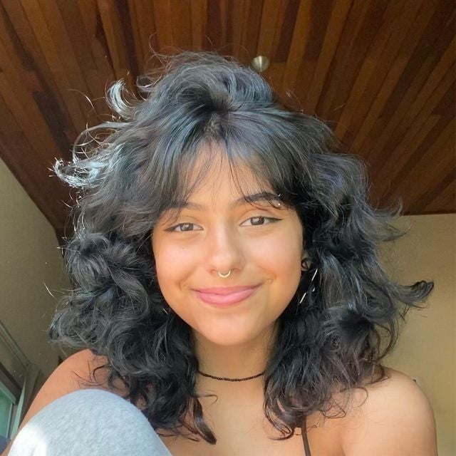 cabelo ondulado com franja