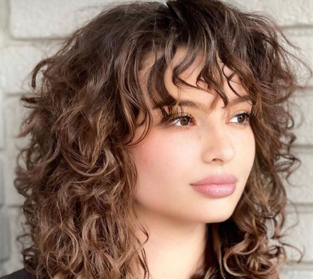 cabelo ondulado com franja