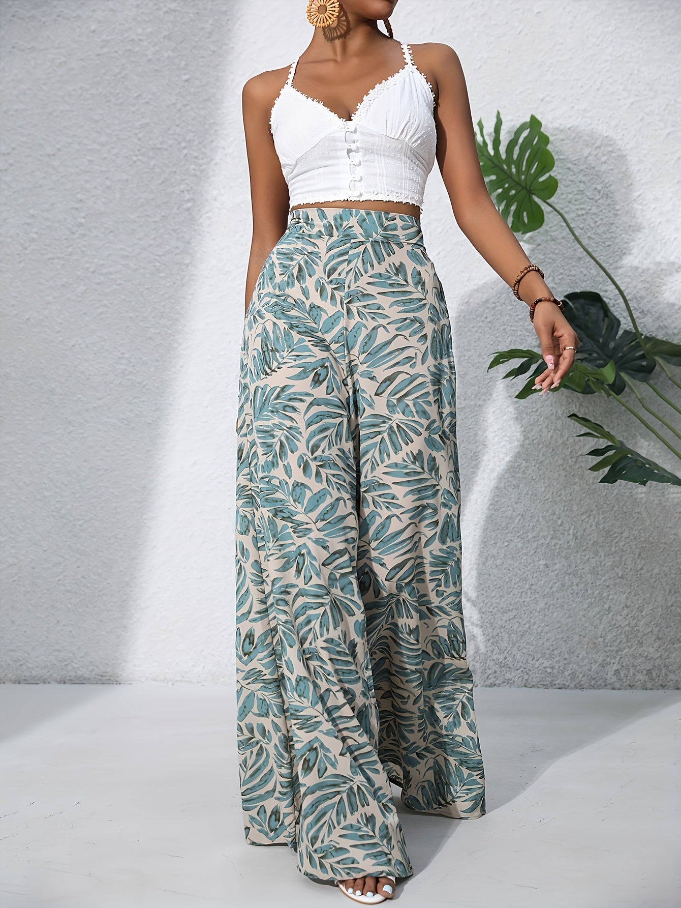 calça pantalona estampada abstrata