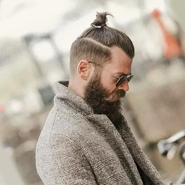 corte de cabelo masculino raspado embaixo e grande em cima