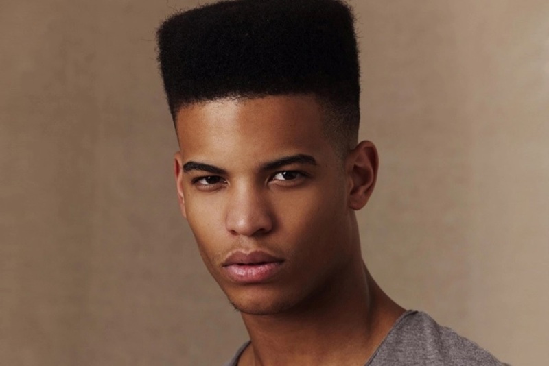 A História e Evolução do Corte Militar Masculino para Cabelos Crespos