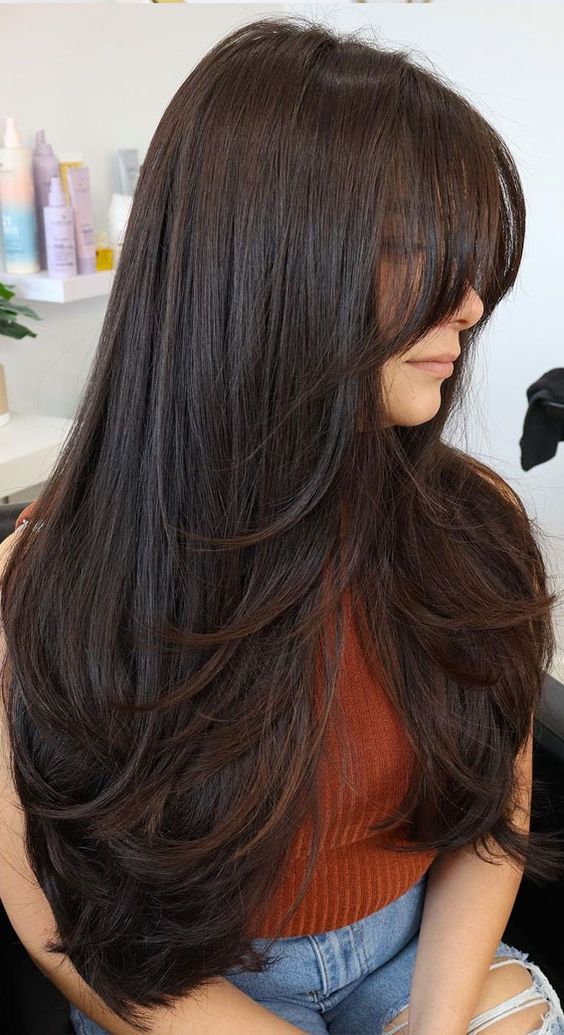 corte com franja cabelo liso longo