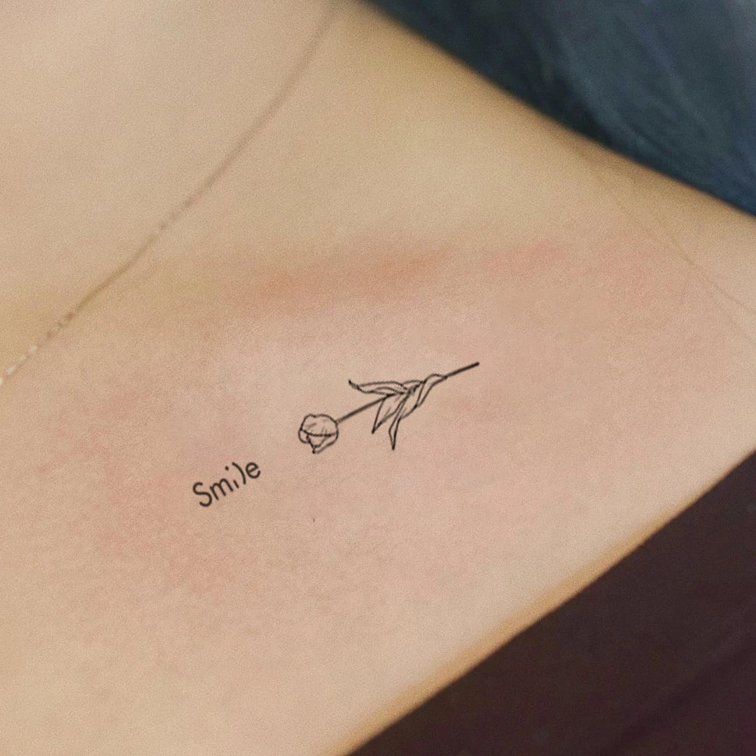 ideias tatuagem flor pequena feminina