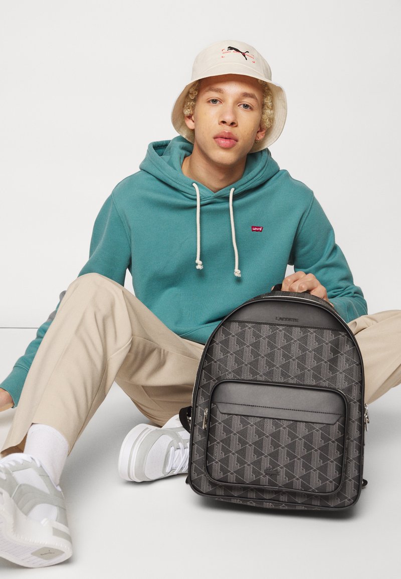 mochila lacoste rfid