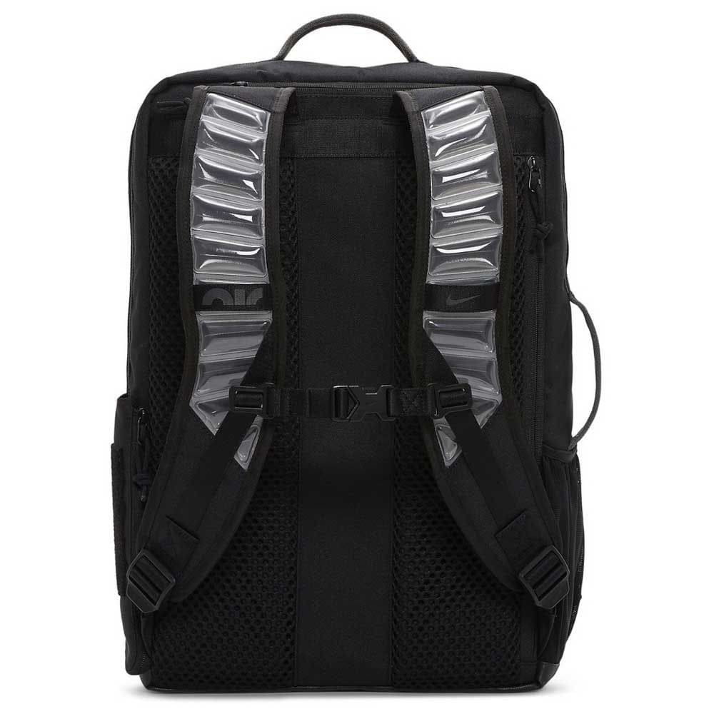 looks com mochila nike utility