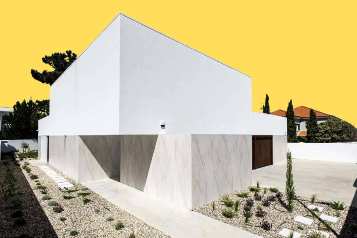 fachada de casa moderna com paisagismo