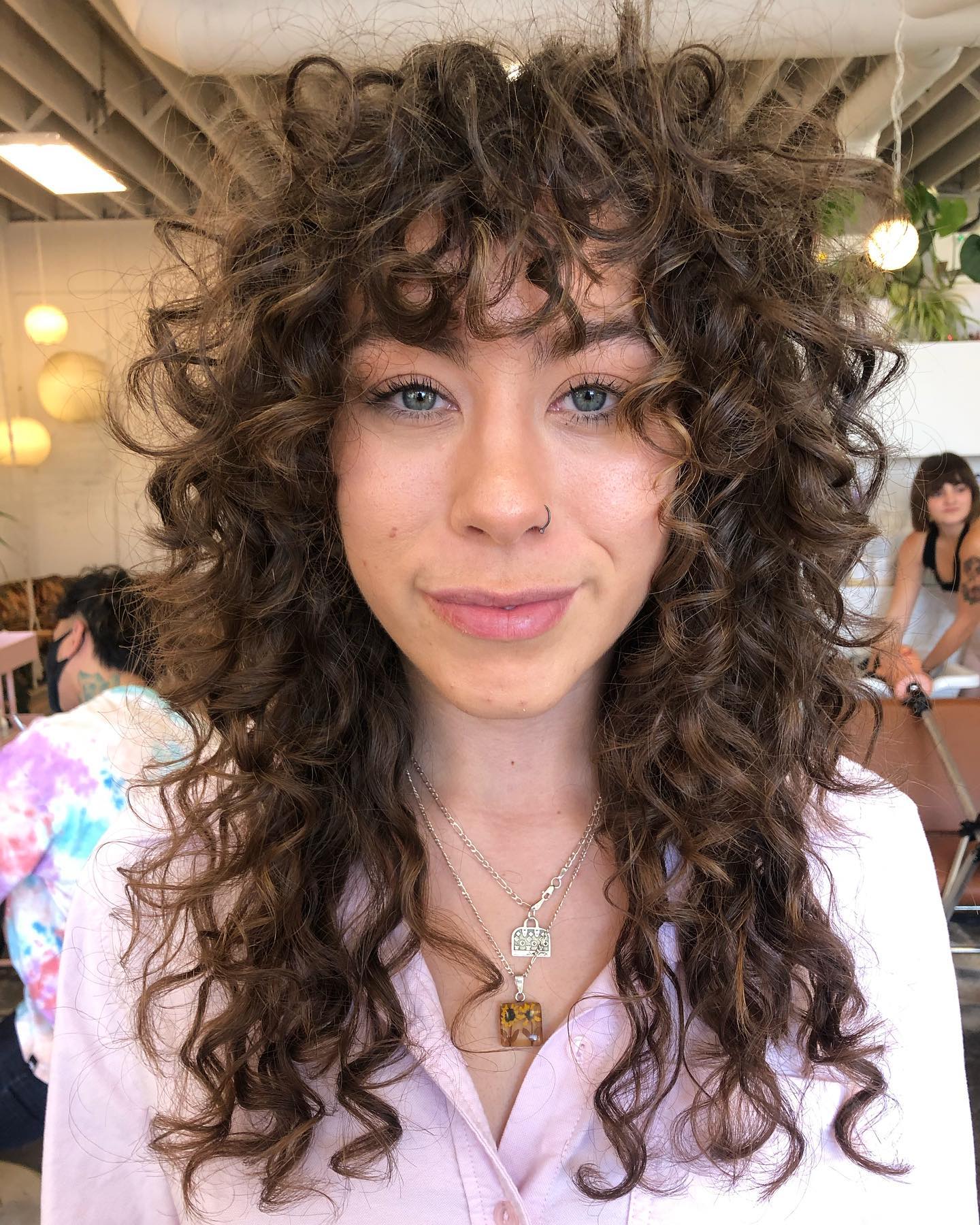 Mullet Cacheado Feminino: Versatilidade e Ousadia para Seus Fios