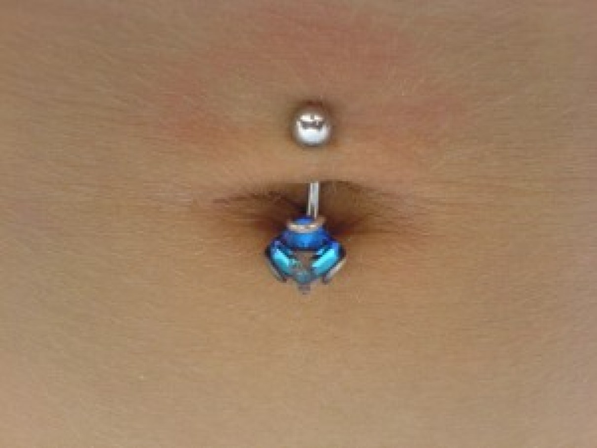 Guia Completo: Como Escolher a Joia Perfeita para seu Piercing no Umbigo