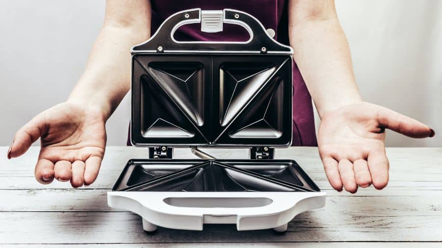 sanduicheira chapa fixa ou removível qual a melhor para limpar