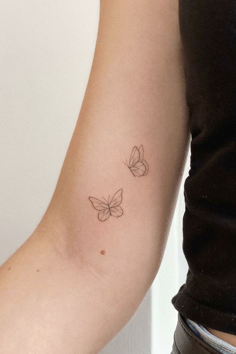 tatuagem borboleta pequena