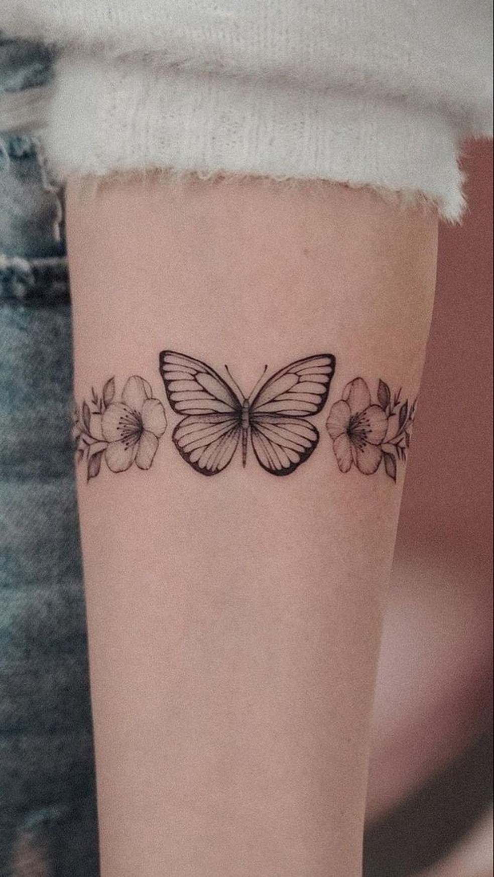 tatuagem de borboleta no braço
