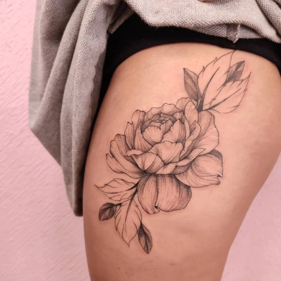 tatuagem de flor de lótus na canela significado