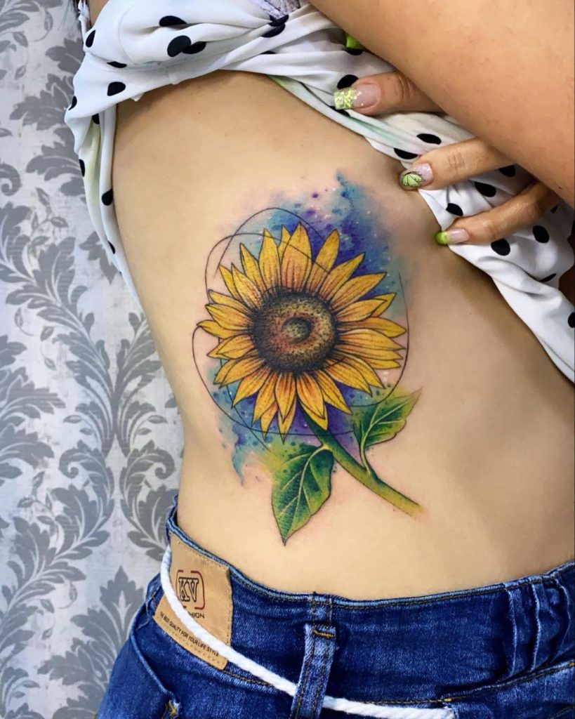 ideias tatuagem girassol feminina delicada