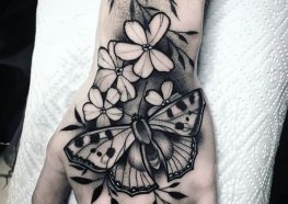 tatuagem girassol com borboleta no braço significado