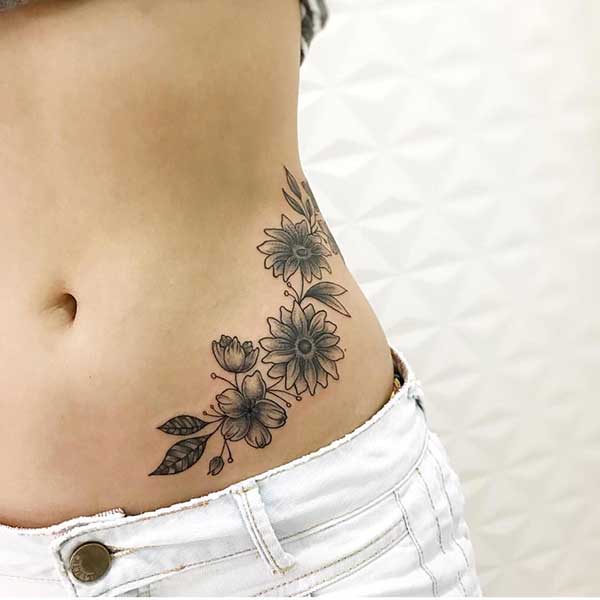 tatuagem frase barriga