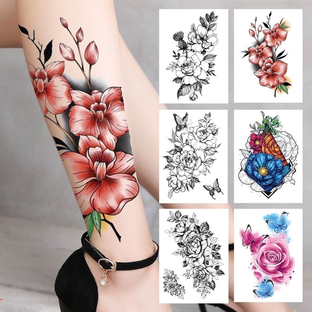 tatuagem de flor na perna feminina delicada
