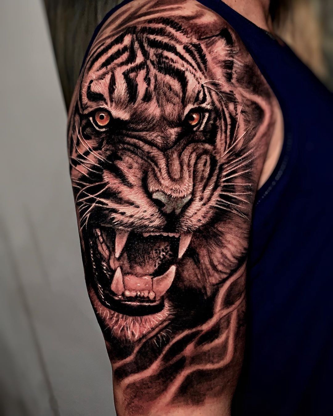 tatuagem no braço: realista vs oriental qual escolher