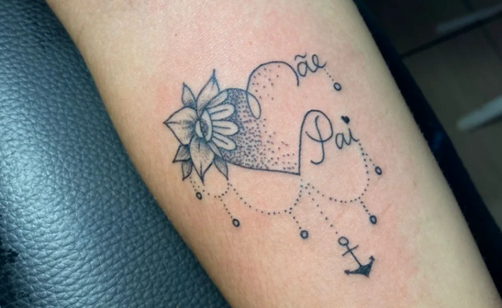 tatuagem resiliência fine line escrita cursiva pulso
