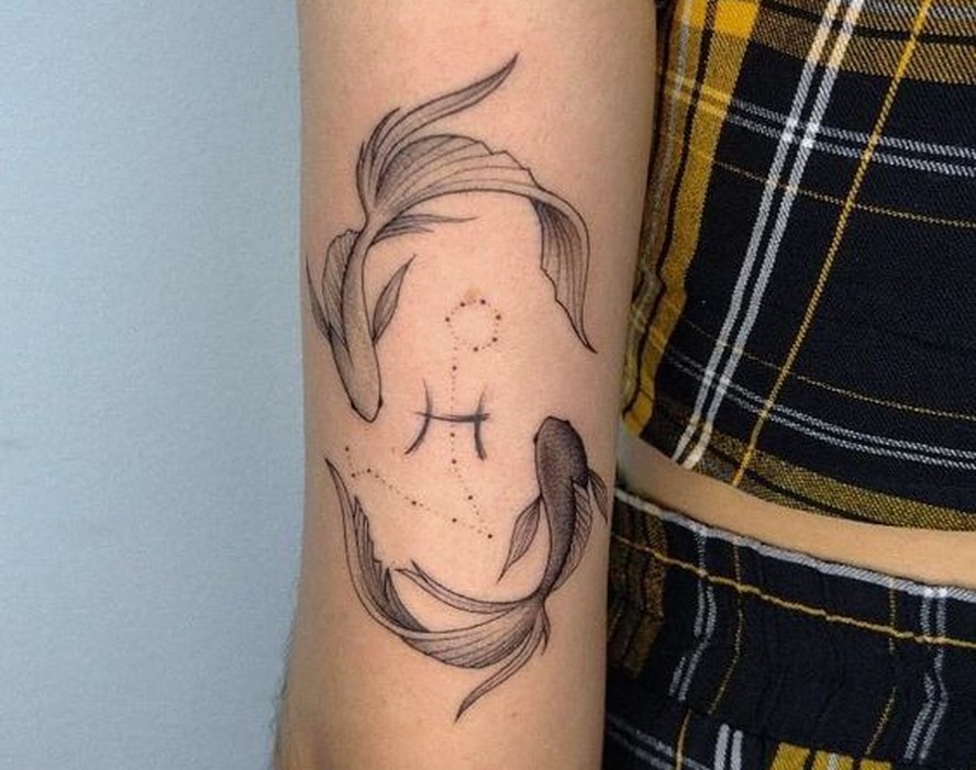 tatuagem signo peixes feminina