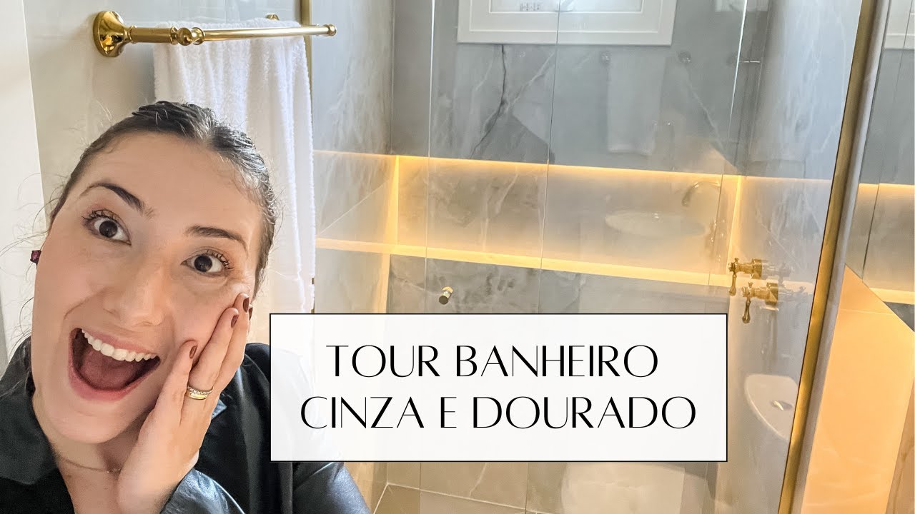 banheiro com detalhes em dourado 11
