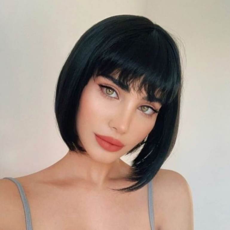 cabelo médio com franja para rosto coração