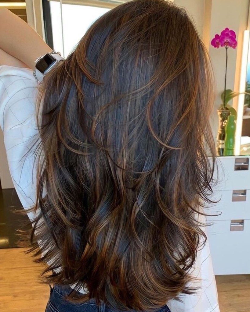 corte longo com franja