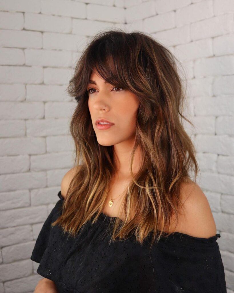 corte de cabelo longo com franja 2026