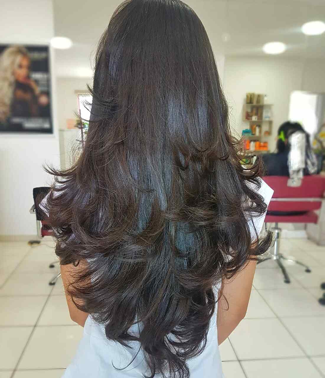 corte de cabelo longo com movimento