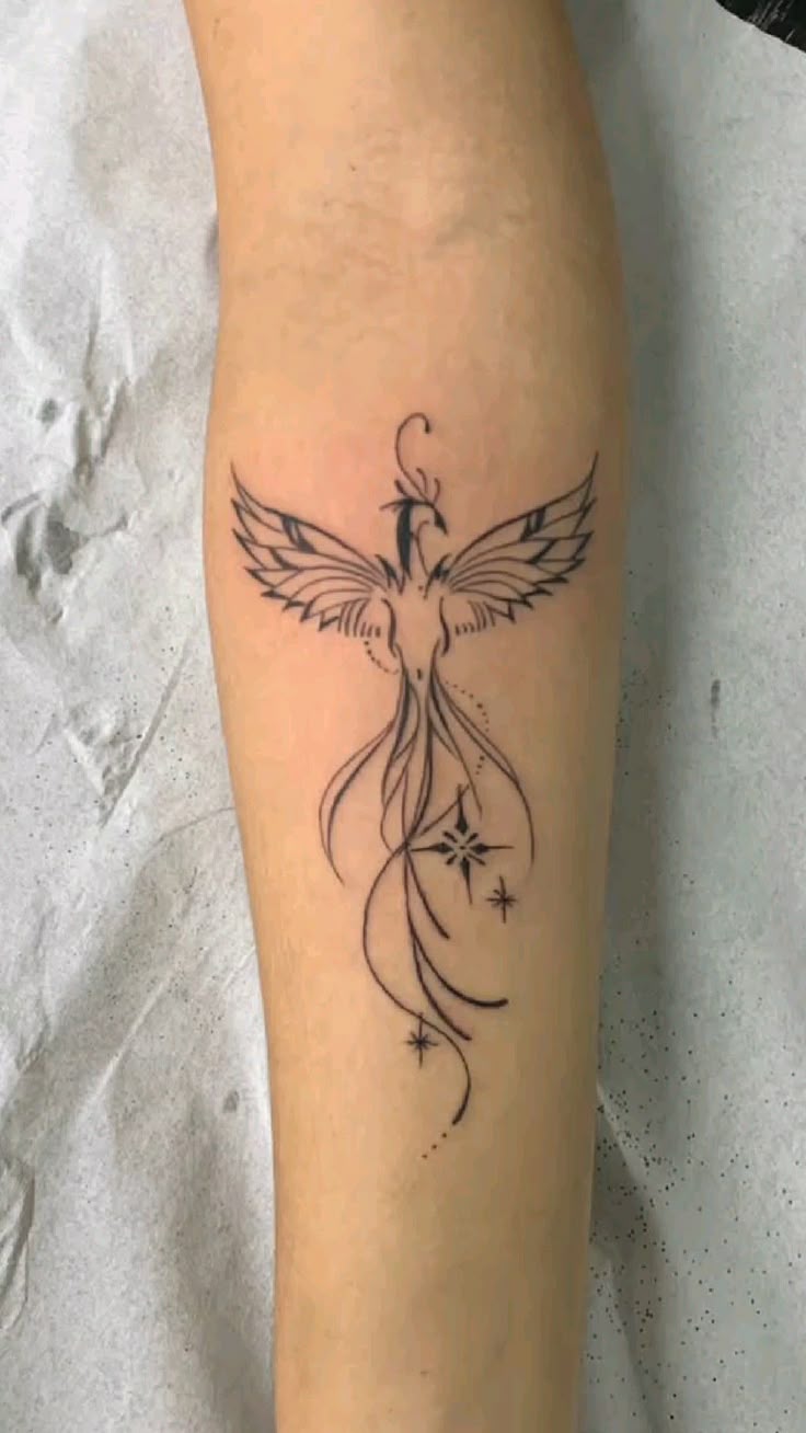fênix tatuagem braço