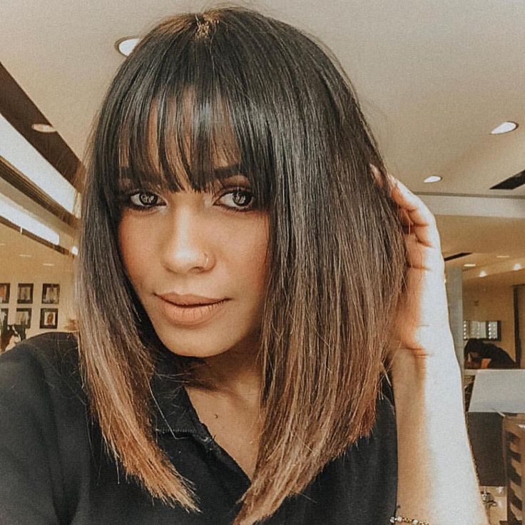 corte long bob com franja para rosto redondo