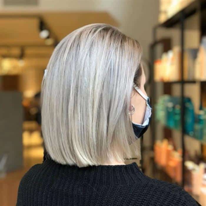 Mechas loiras para cabelo cacheado