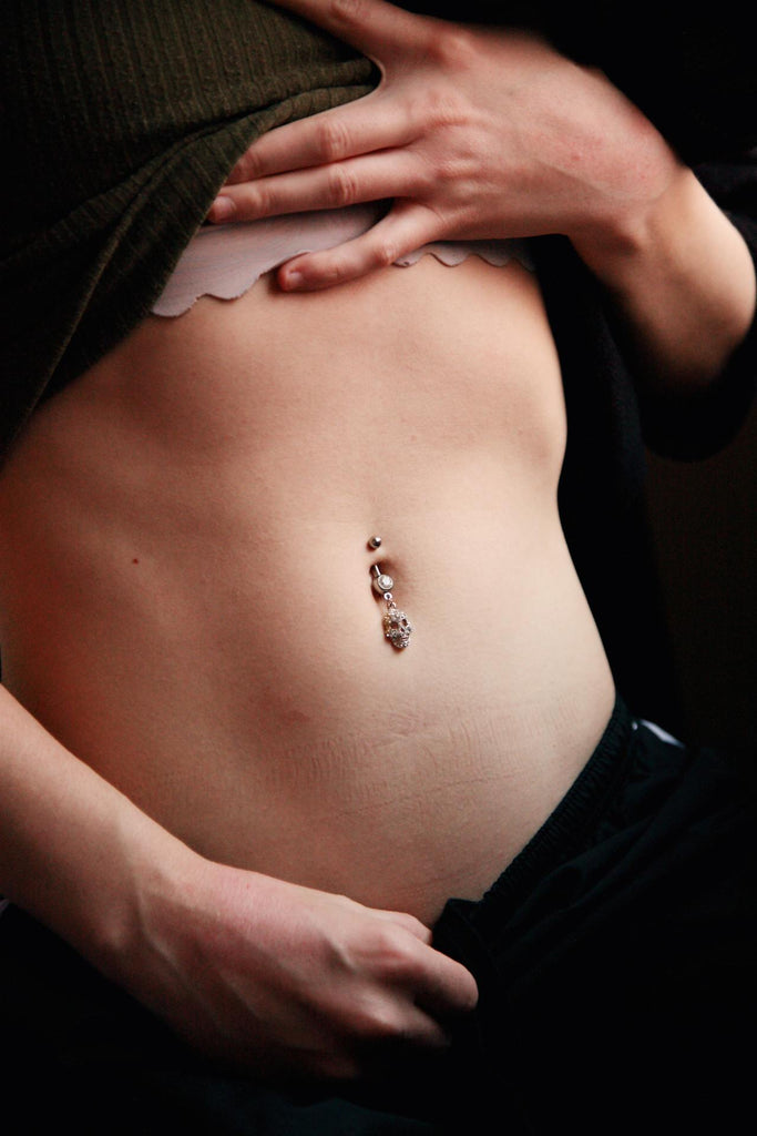 dor piercing umbigo cicatrização