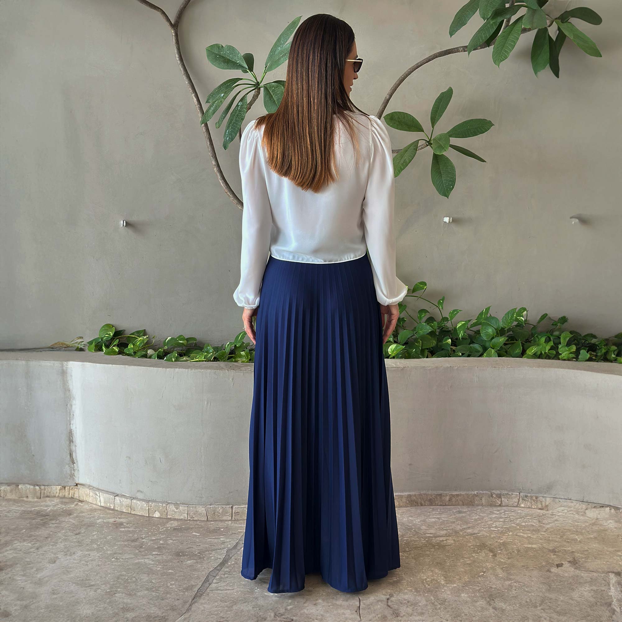saia plissada comprida com blusa