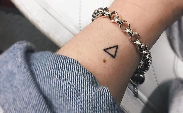 tatuagem triangulo mente corpo espirito