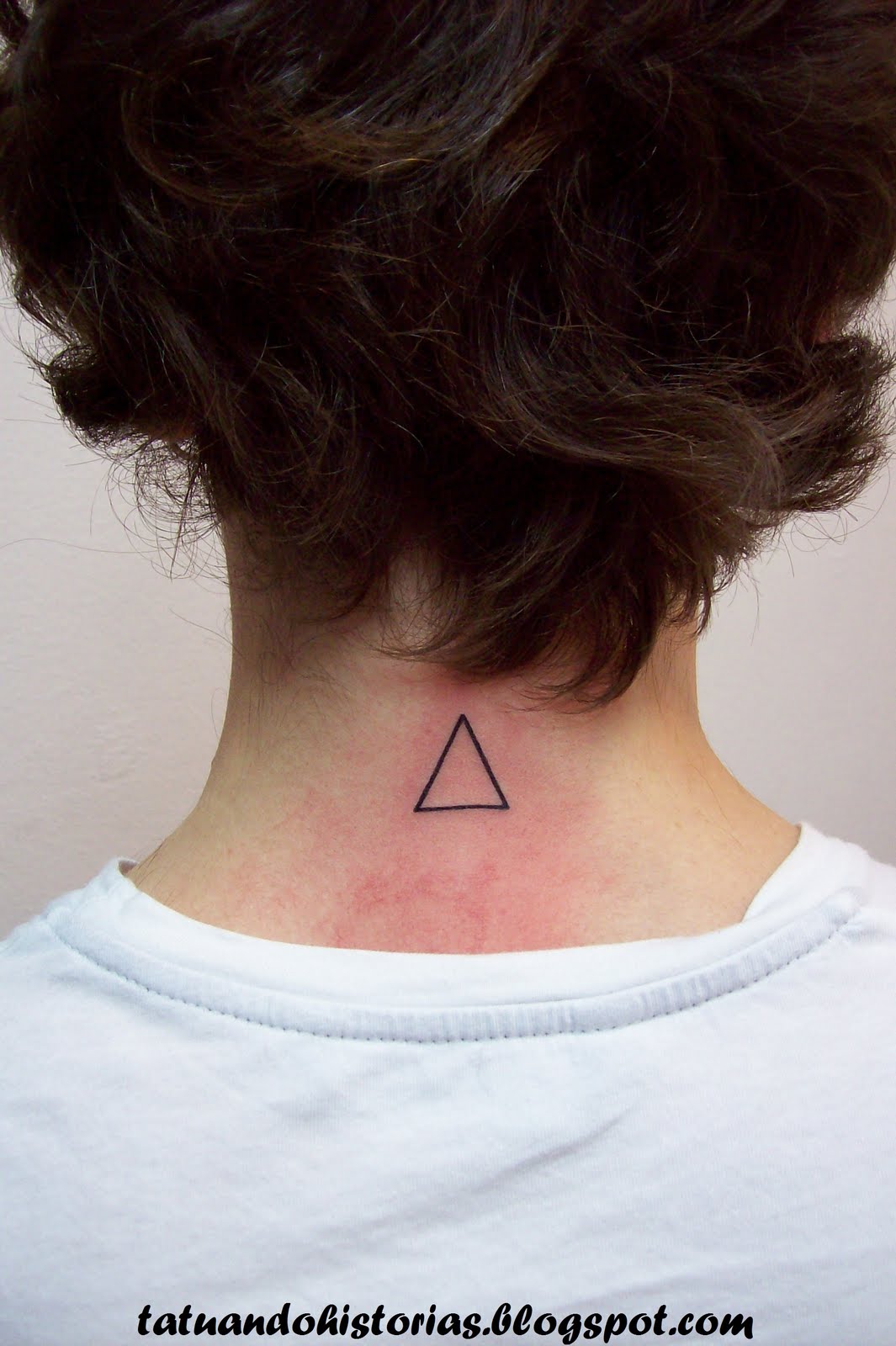 tatuagem triangulo para baixo significado
