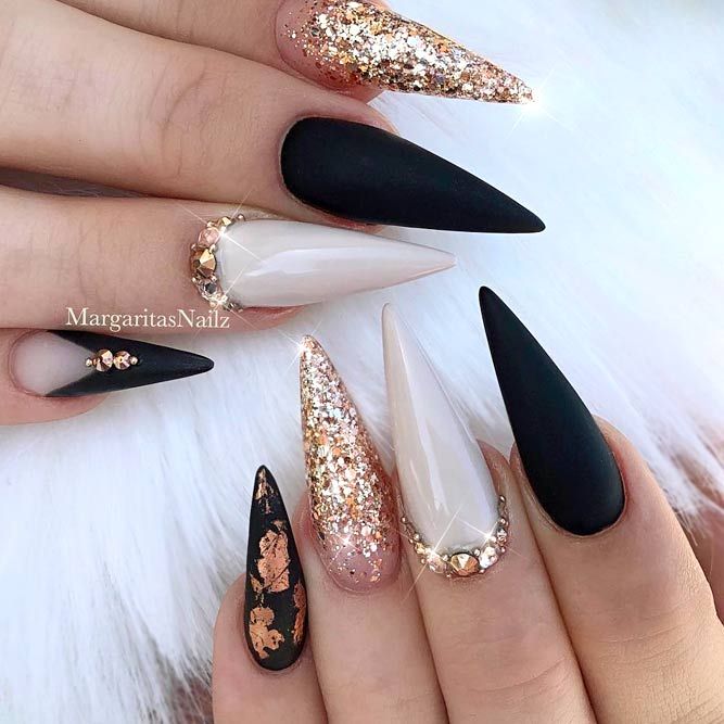 unha stiletto curta