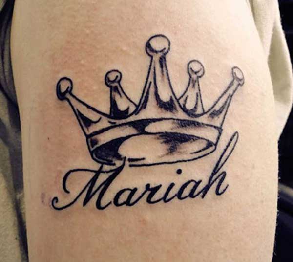 tatuagem com nome de filho no pulso