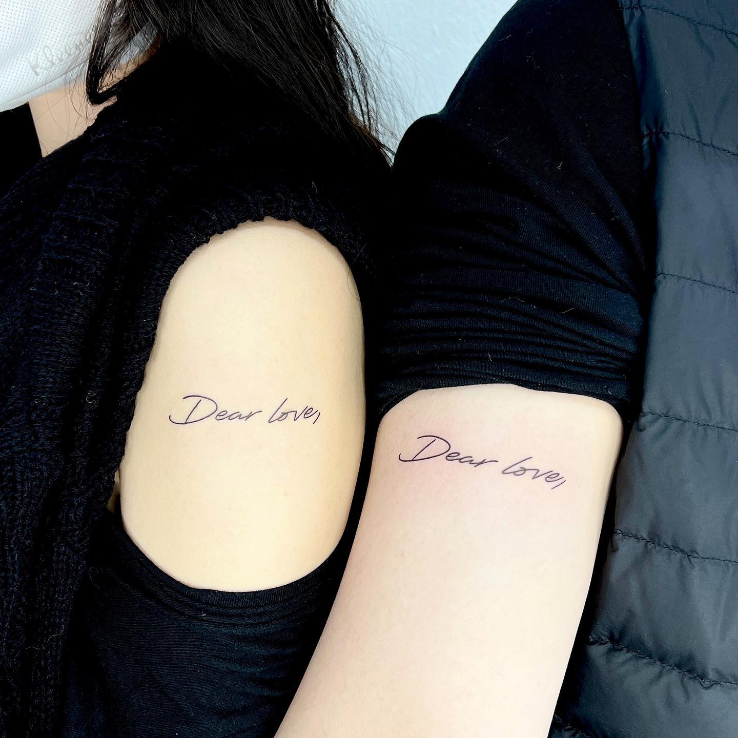 tatuagem de casal no braço