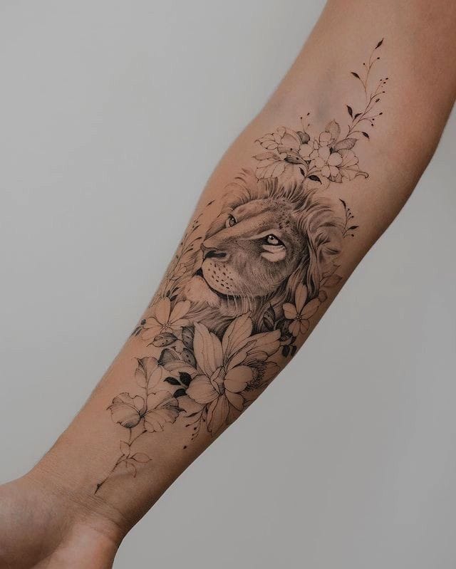 tatuagem leoa feminina braço