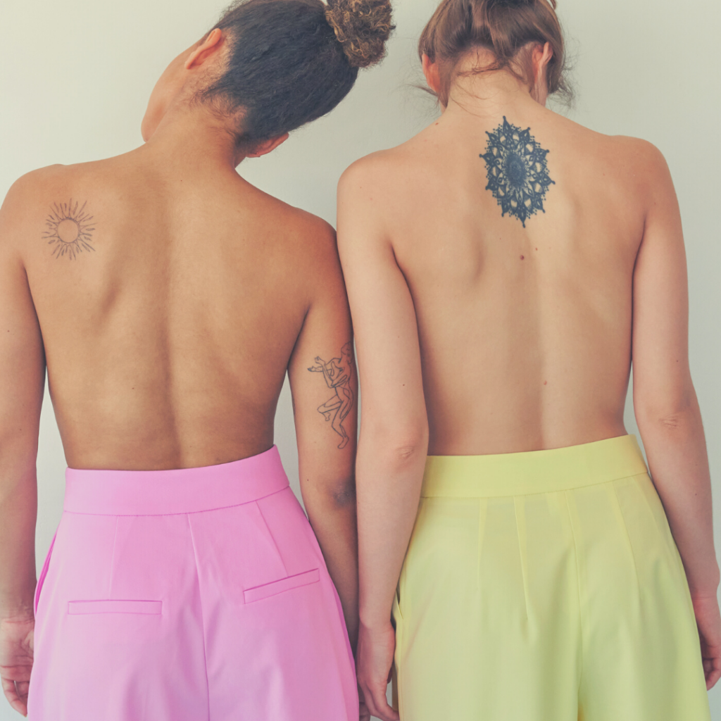 tatuagem feminina costas delicada