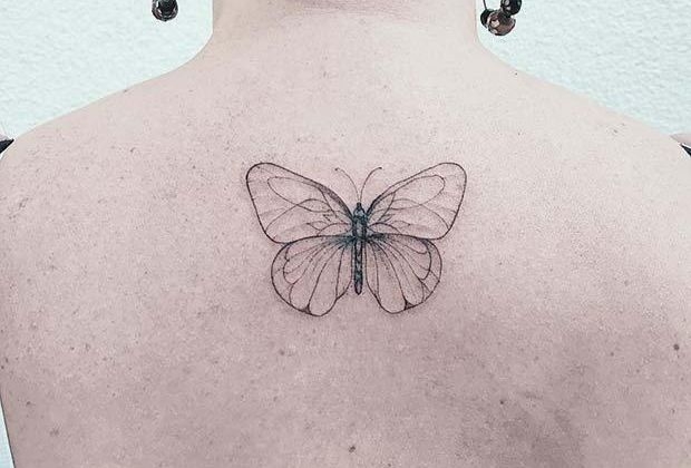 tatuagem lótus costas