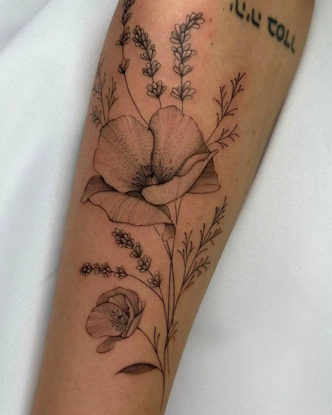 tatuagem no braco feminina