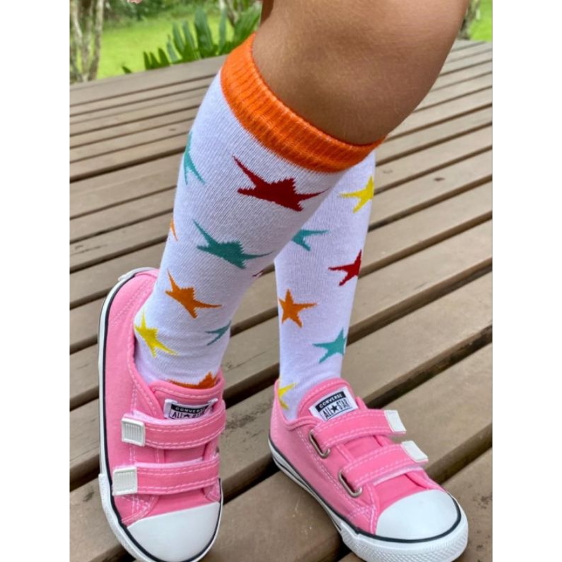 tênis meia com calça jeans flare
